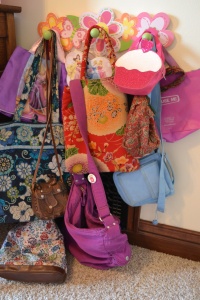 Nattie's purse collection has grown to include full-size "mommy" purses all packed for her trips to town, church and the combine. 