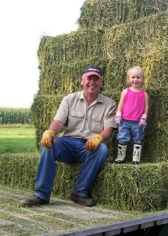 Nattie & Papa baling hay