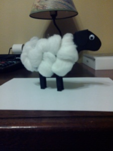 We crafted this sheep using black cardstock instead of white and used a "google" eye instead of drawing one on the face.  The clothespins were also painted black, but could be colored with a black permanent marker. 