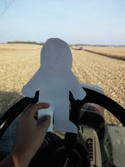 Flat Aggie drives the tractor